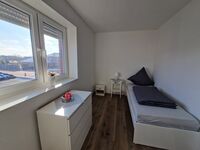 Monteurwohnung RoomWork24 – 10 Betten | Parkplatz Bild 14