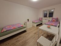 Monteurwohnung RoomWork24 – 10 Betten | Parkplatz Bild 21