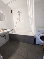 Badezimmer mit Waschmaschine